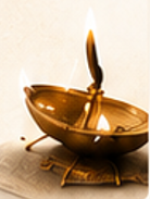 Traditional brass diya representing Vedic wisdom